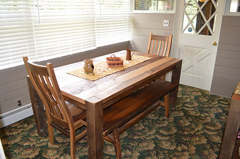 The center of the farmhouse has a beautiful fireplace to warm up and relax our guests.