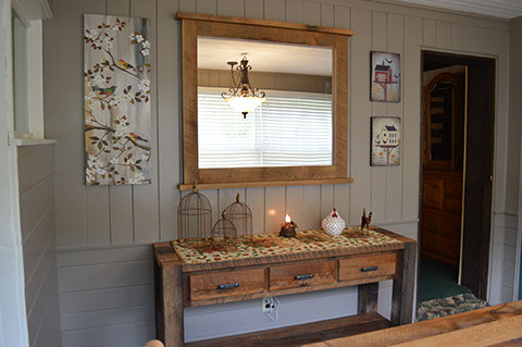 The center of the farmhouse has a beautiful fireplace to warm up and relax our guests.